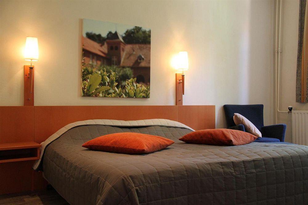 Hotel De Volksabdij Ossendrecht Pokoj fotografie